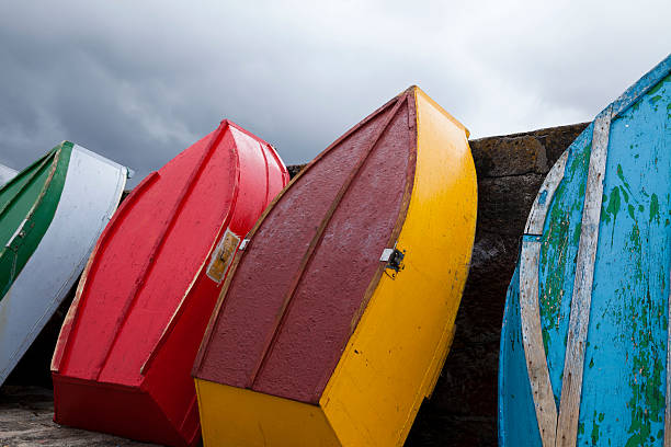 istock Colorful standing boats 187247339