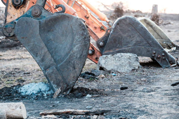 istock excavator buckets are grounded, metal buckets after work 1872475518