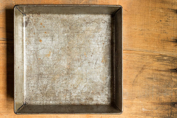 istock Old Baking Pan on a Wooden Crate with Copy Space 187247568
