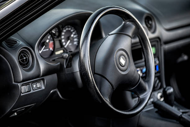 istock Inside old sportscar with view on the steering wheele 187247930