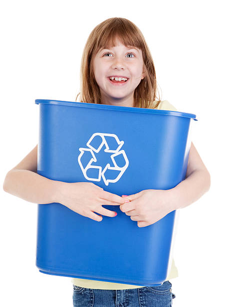 istock Cute Little Girl Holding Recycling Bin 187247995