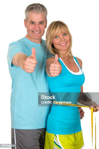 Man And Woman Wearing Sportswear With Thumbs Up Stock Photo - Download Image Now - 40-44 Years, 50-54 Years, Adult