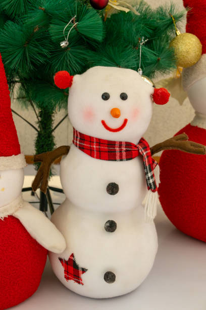 istock a cute snowman in the indoor at vertical composition 1872490685