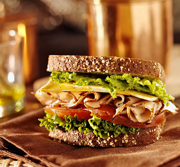 deli-sandwich mit fleisch mit der türkei - delicatessen meat cold cuts chopped stock-fotos und bilder