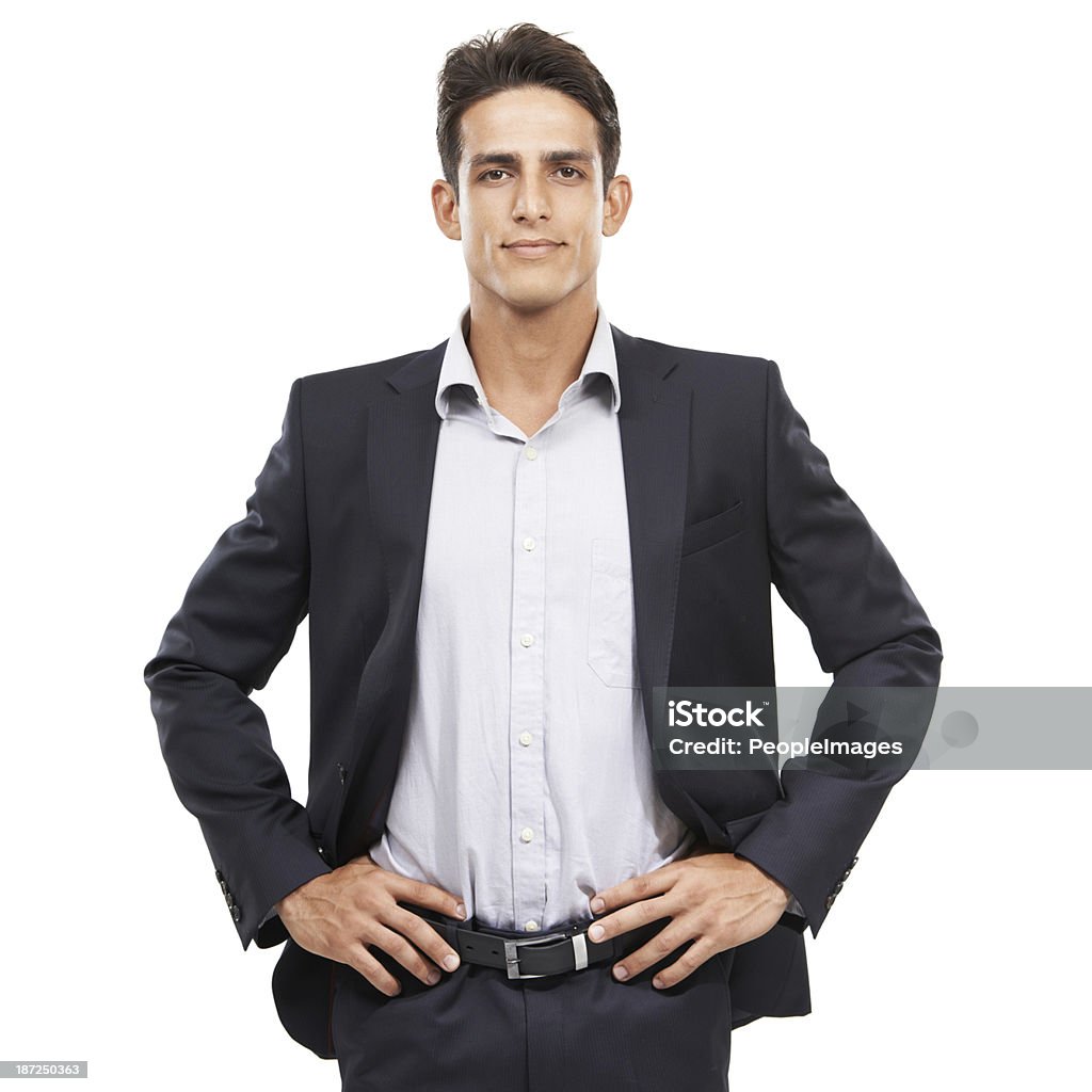 He's ready for any business challenge Portrait of a handsome young man standing with his hands on his hips 20-29 Years Stock Photo