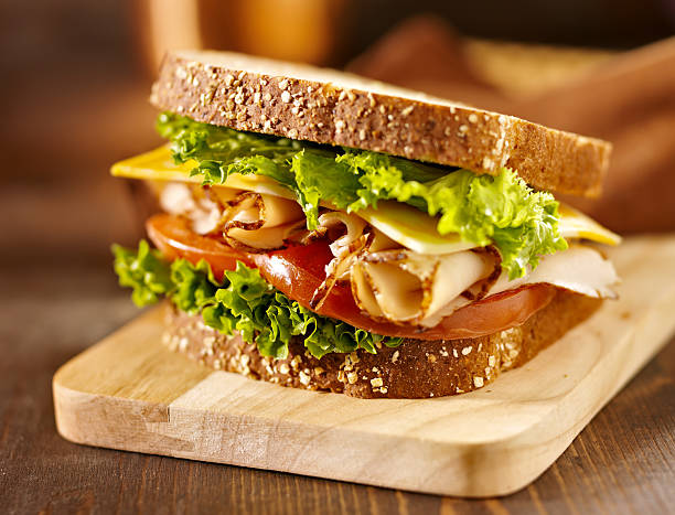 deli-sandwich mit fleisch mit der türkei - delicatessen meat cold cuts chopped stock-fotos und bilder