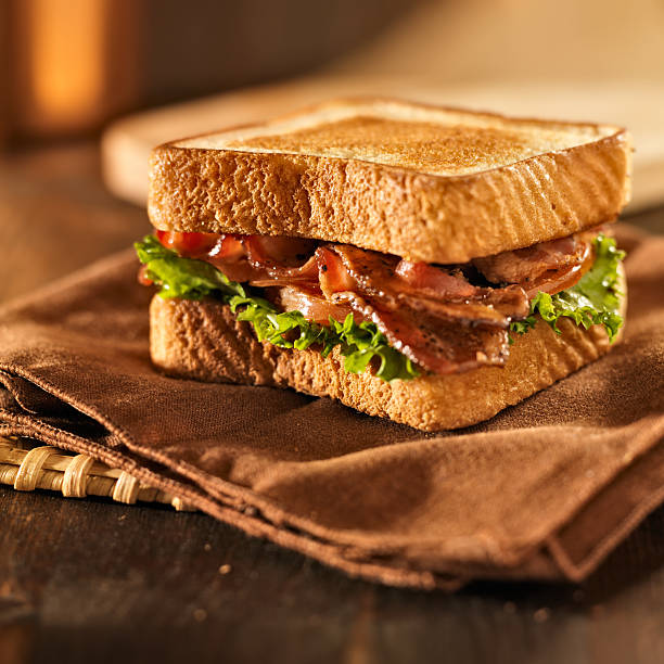istock BLT bacon lettuce tomato sandwich on a napkin 187250654