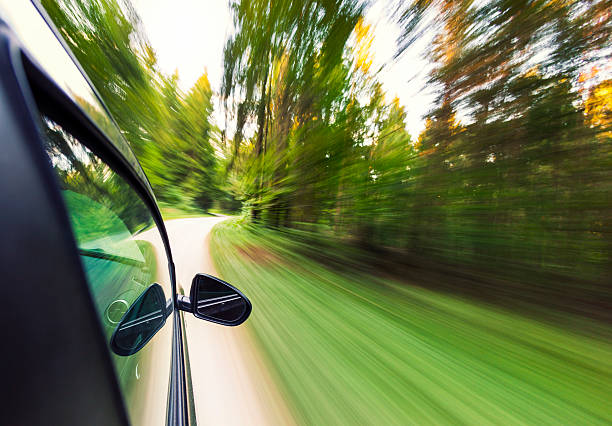 istock Car speeding on country road 187251456
