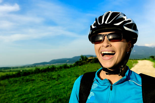 istock happy biker woman portrait 187252212