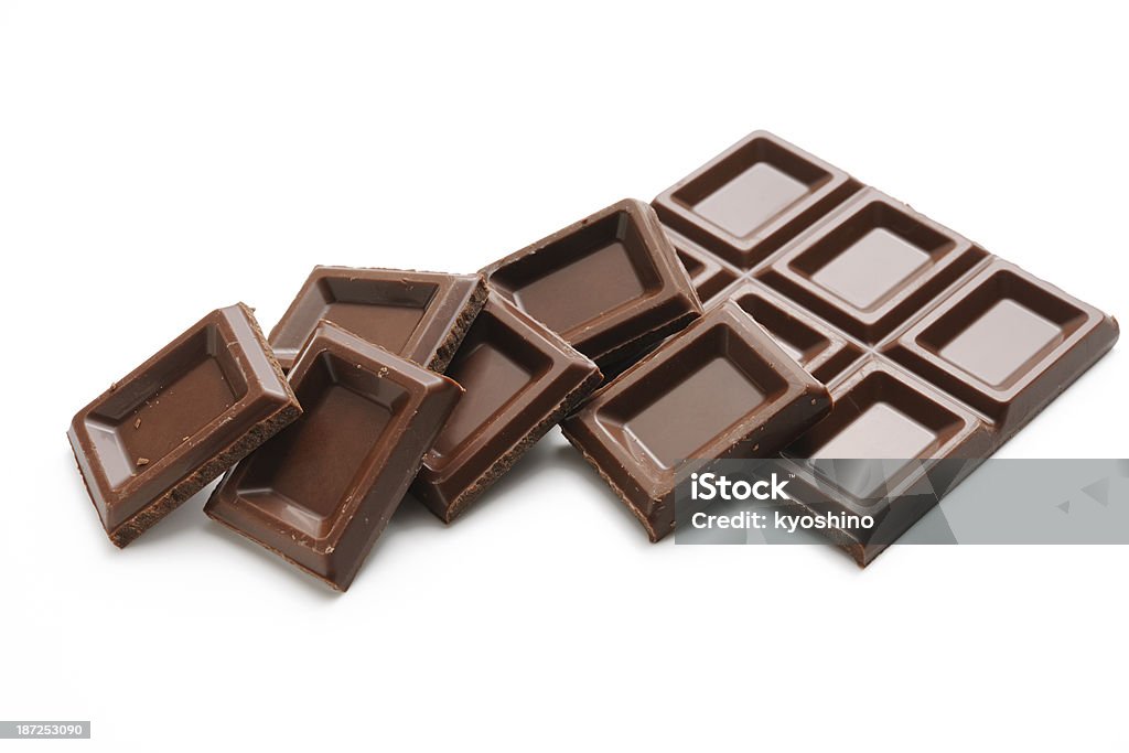 Isolato spruzzata di cioccolato impilati bar su sfondo bianco - Foto stock royalty-free di A forma di blocco