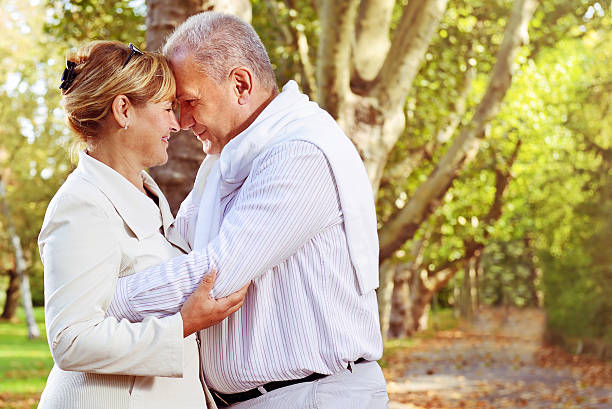 istock Romantic mature couple outdoors 187253502