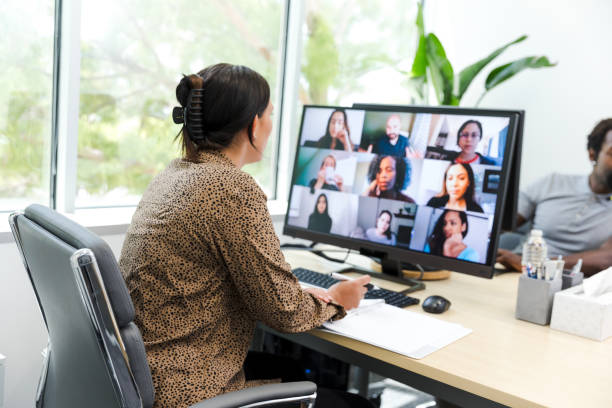 istock Young adult female hosts a virtual training seminar 1872535041