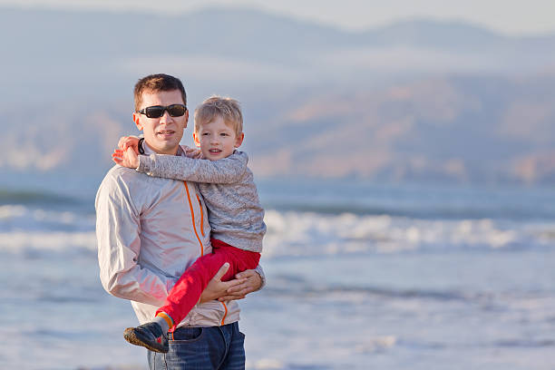 istock family at the beach 187253793