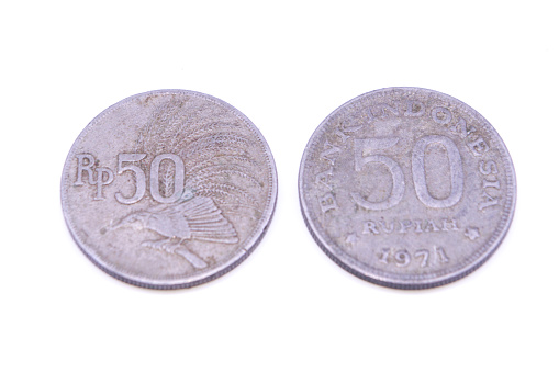 old Indonesia coin money 50 rupiah cendrawasih. on isolated white background