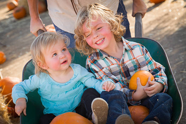 istock Active Family Enjoys a Day at the Pumpkin Patch 187255318