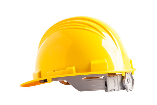 istock Yellow construction helmet isolated on white background with clipping path, engineer safety concept. 1872555601