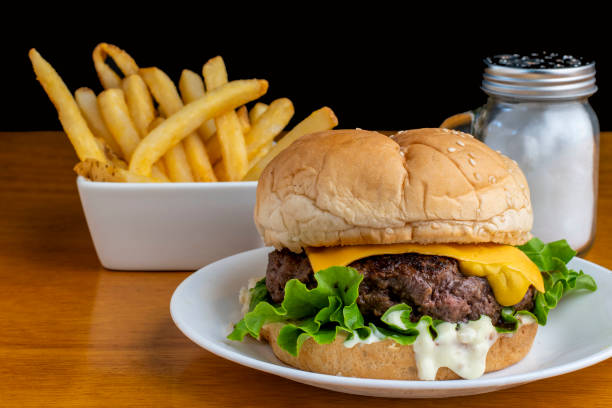 istock hamburger top with cheese and  mustard on  a sesame bun 1872560998