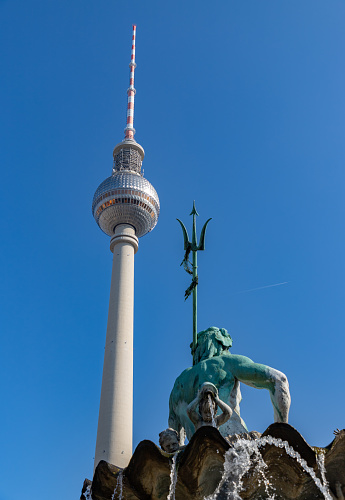 A picture of the Neptune Fountain and the Berliner Fernsehturm.