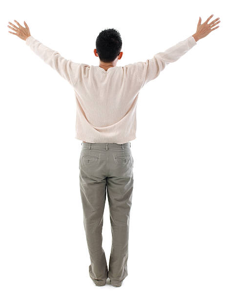 istock Rear view Asian man arms outstretched 187256355
