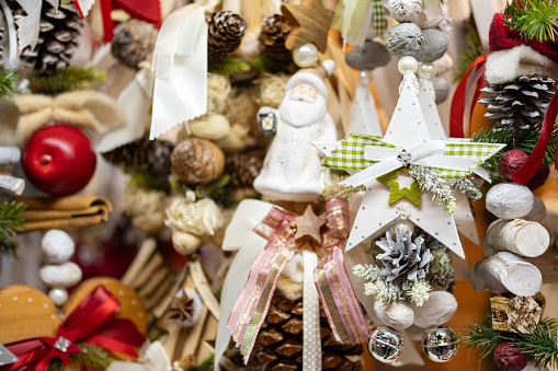 Christmas decorations and cookies on sale at Christmas Market in Nuremberg, Germany. Focus in center.