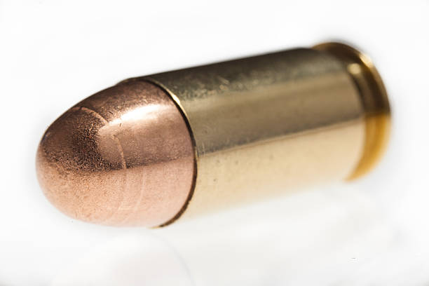 Isolated 45mm bullet stock photo