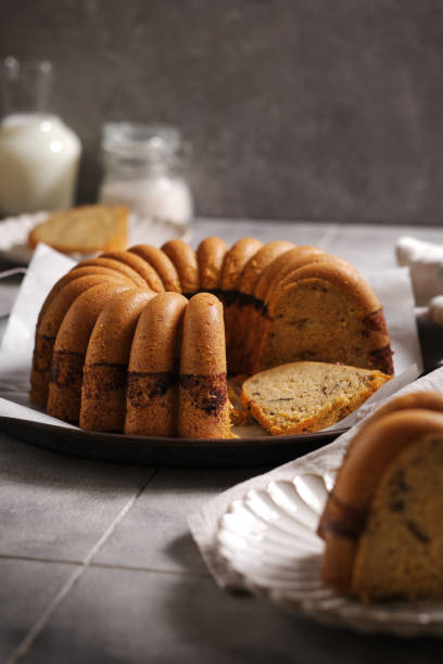 istock homemade marble cake on a rustic plate with rustic grey tiles background 1872584639