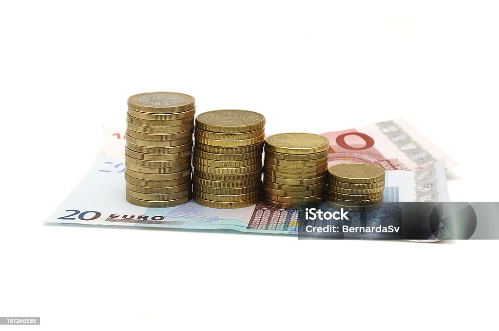 Conceito de recessão com notas e moedas - Foto de stock de Amontoamento royalty-free