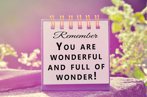Motivational and inspirational quote with phrase - Remember, you are wonderful and full of wonder.