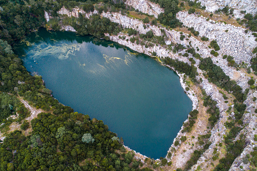 drone aerial view of old abandoned quarry