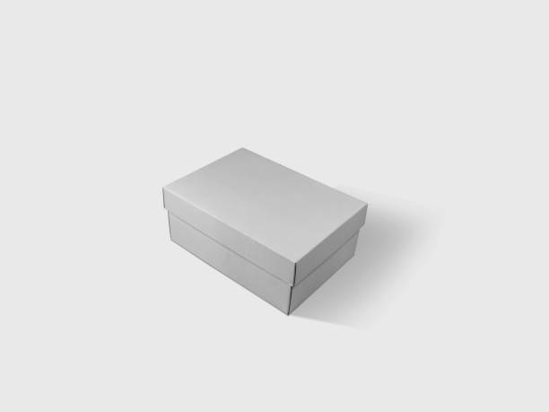istock Shoe Box Paper Package Box Mockup Isolated on White Background. 3D Rendering 1872633332