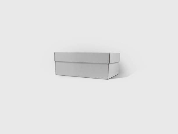 istock Shoe Box Paper Package Box Mockup Isolated on White Background. 3D Rendering 1872633337