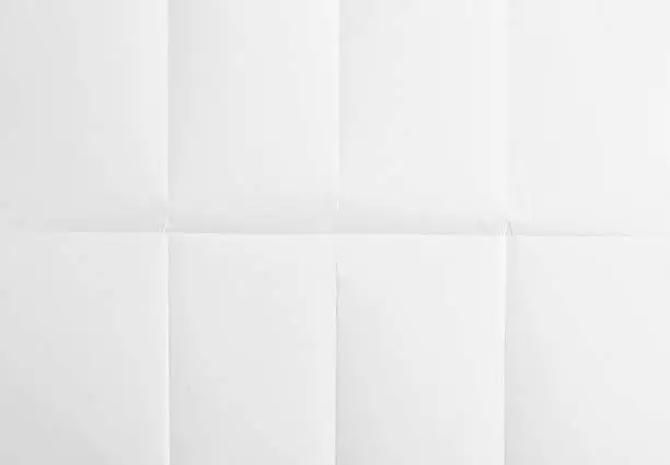 white sheet of paper folded in eight