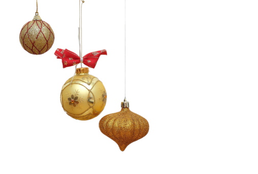 three different beautiful golden christmas baubles