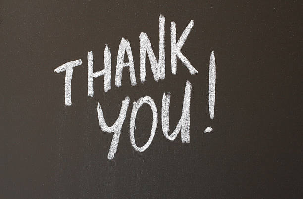 istock Thank you card on brown background with white letters 187264363