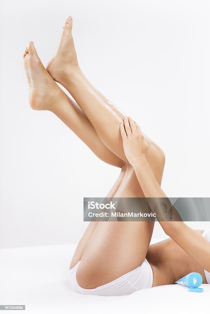 Bella donna gambe - Foto stock royalty-free di Adulto