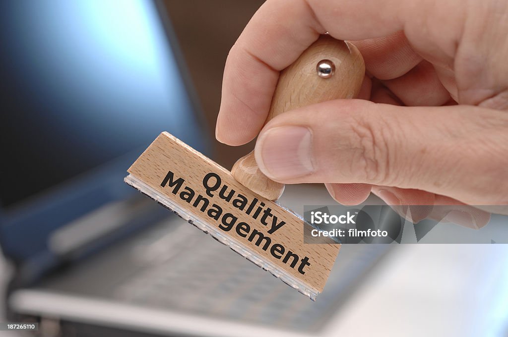 quality management Quality management marked on rubber stamp Leadership Stock Photo