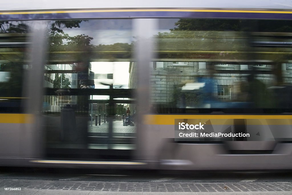 public transportation Light railway train movinf fast on the street Bus Stock Photo