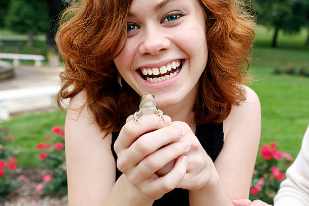 istock Young Woman and Frog 187266950