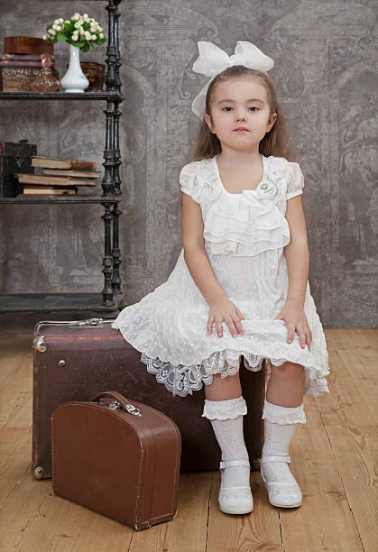 Little girl looking at the camera. Retro style.
