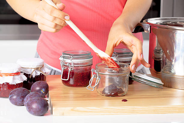 istock Putting fresh jams into a jars 187270350