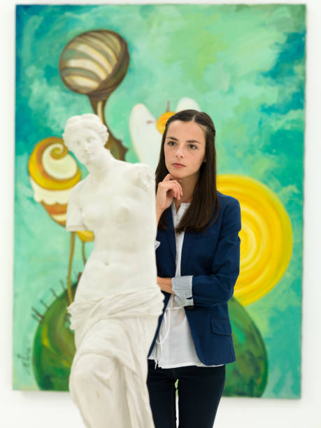 istock reflective woman in art gallery 187271045