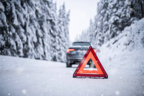 istock Car accident on a snowy road. 1872717631