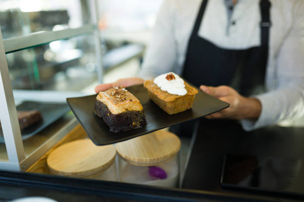 istock Barista worker serving dessert at the cafe restaurant 1872720785
