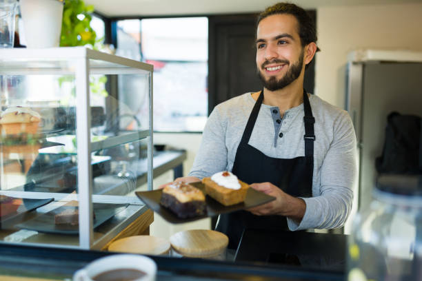 istock Cheerful happy working at the cafe restaurant 1872720799