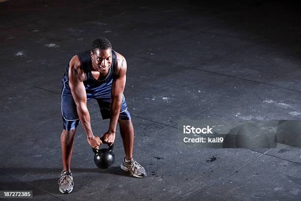 Man Working Out With Kettle Bell Stock Photo - Download Image Now - Kettlebell, Men, African Ethnicity