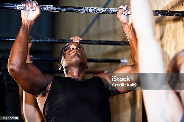 Athletes Doing Pullups In Gym Stock Photo - Download Image Now - 20-29 Years, 50-59 Years, Active Lifestyle