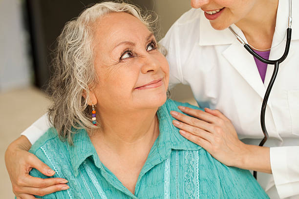 istock Senior woman with doctor 187273249
