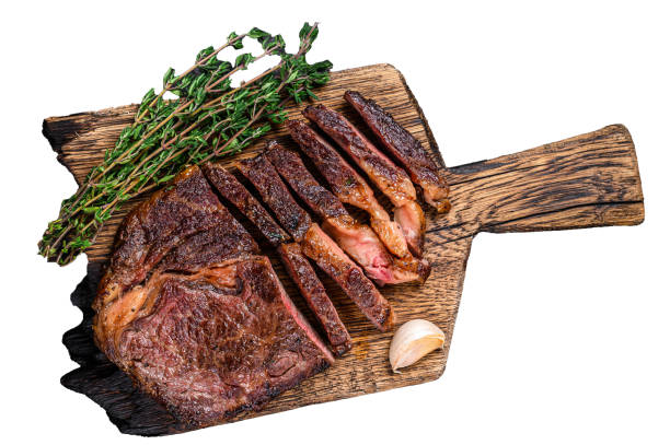 istock Roasted and sliced rib eye beef meat steak Isolated on white background, top view. 1872748421