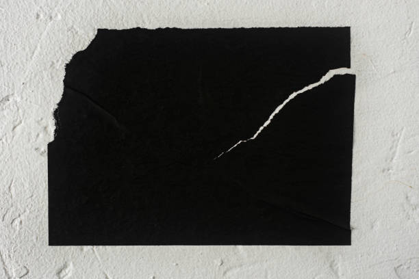 istock Black poster with cracks close-up. 1872748566
