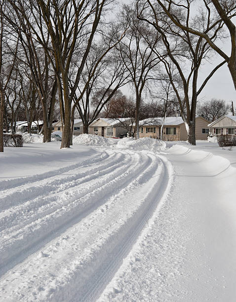 istock Tracks of wheels in snow 187275259